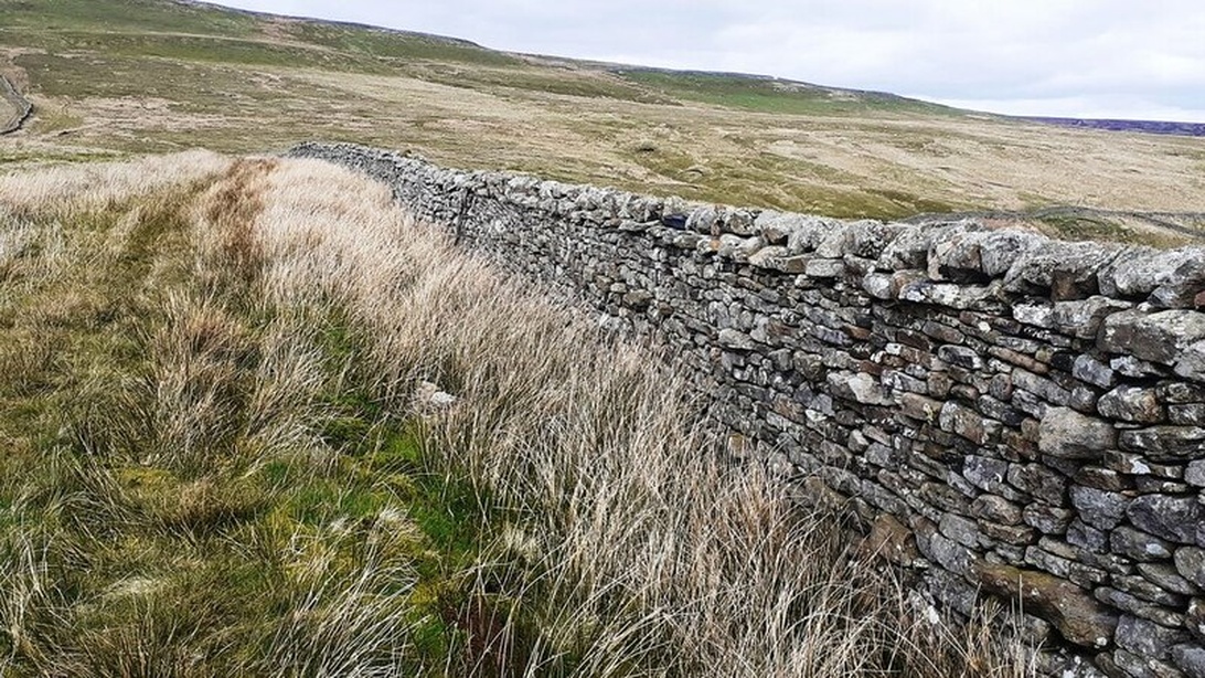 The Ancient Craft of Scottish Dry Stone Walls Image